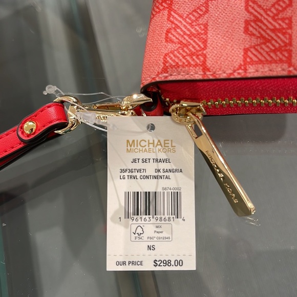 MICHAEL KORS Leather Continental Phone Holder Wristlet Wallet 
Dark Sungria
NWT